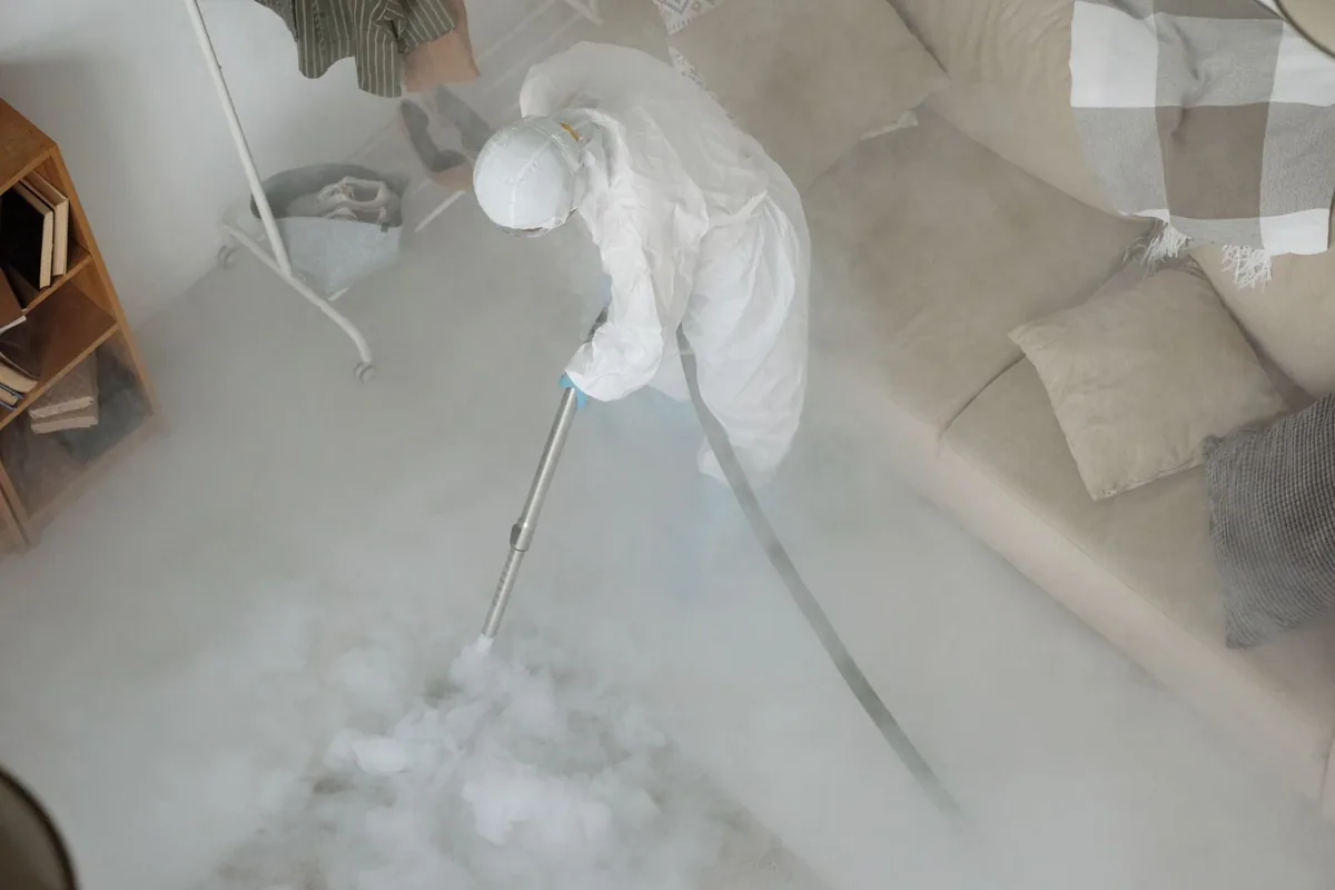 Biohazard cleanup technician in protective equipment, Arkwright, SC